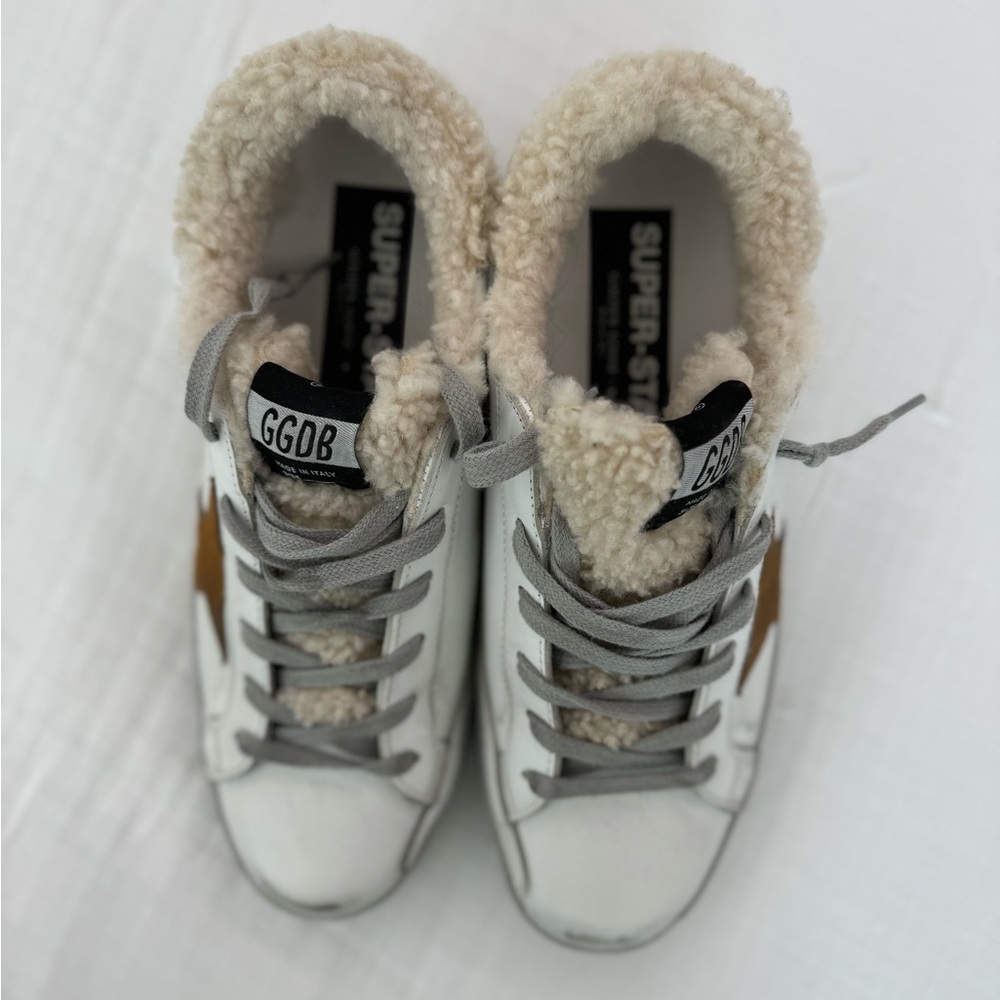 Golden Goose white sneaker with star accent and sterling lined